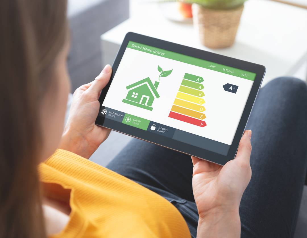 Energy efficiency mobile app on screen. Ecology, eco house concept
